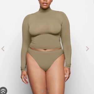 SKIMS army green soft smoothing turtleneck